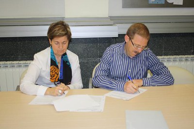 Imatge de la signatura amb Amadeu Urrea, director de la Banda Municipal de Lleida..