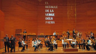La Banda Municipal i Veus.kat han ofert el concert El Retaule de la Verge dels Paers, a l'Auditori, amb motiu Sta. Cecília, de la patrona de la música.