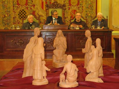 El pessebre presideix el saló en l'acte d'obertura del Cicle de Nadal.