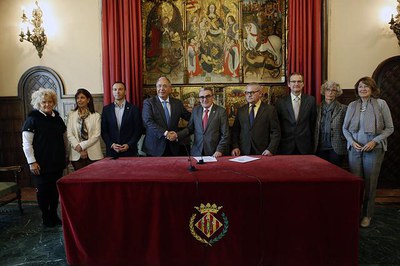 Signatura de convenis entre la Paeria i la UdL, aquest dijous, al Saló del Retaule de la Paeria.