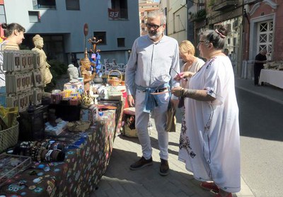 Els paradistes han explicat al paer en cap els productes que han exposat.