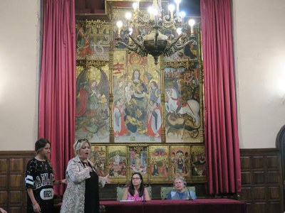 La visita ha inclòs la interpretació d'una peça vocal..