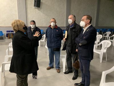 Malla conversa amb Pueyo i el president del canal, Ramon Piqué.