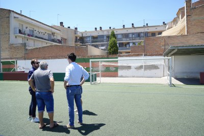 Postius i Amor, amb el president del club durant la visita.