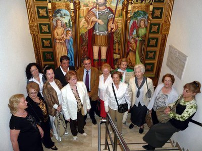 3) El retaule de Sant Anastasi de Manuel Uceda resta exposat a la llar de Sant Anastasi.