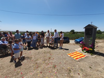 Ofrena floral a Sant Salvador, patró de la partida.